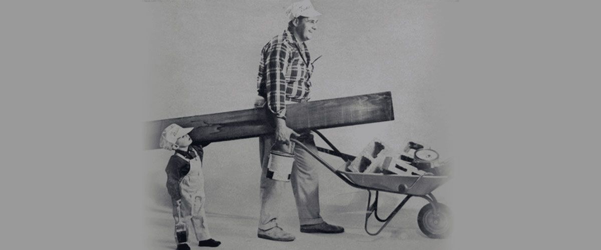 Mr. Wiese With his son moving painting  equipment. 