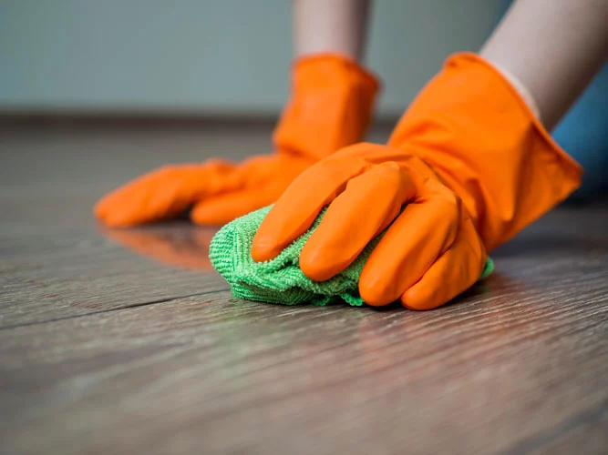 person applying chemical resistant floor paint